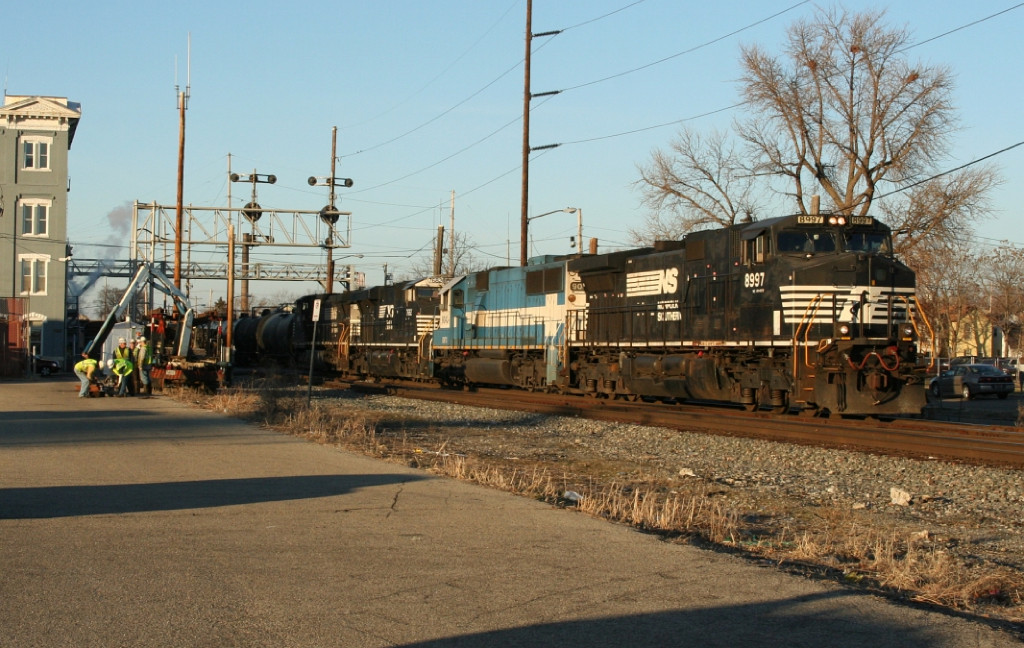 NS SB freight going by CSX MOW gang
